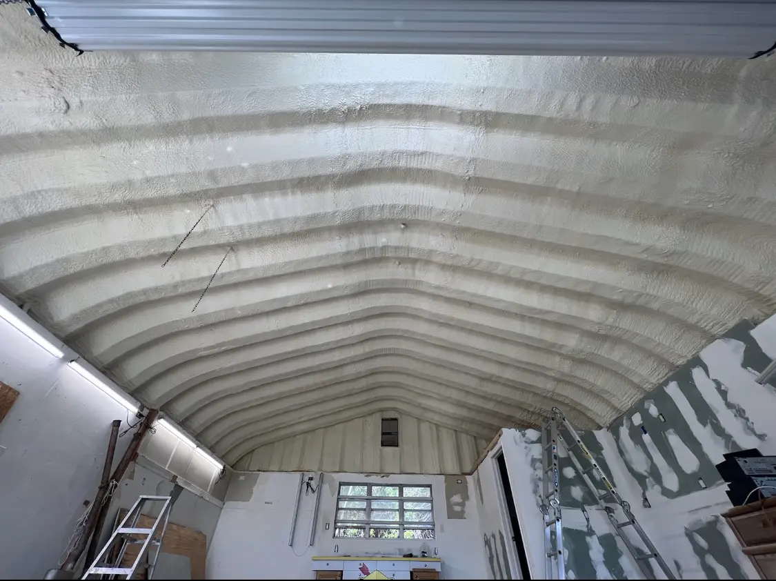 Spray polyurethane foam applied to the underside of a metal roof deck in Mount Morris